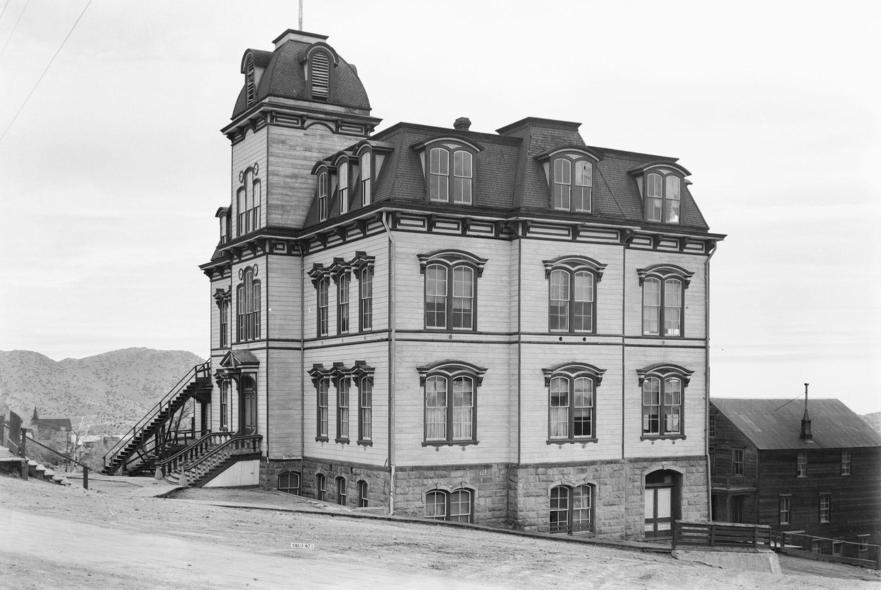 Architectural photograph of the Fourth Ward School exterior showing its mansard roof, tower, and window detailing