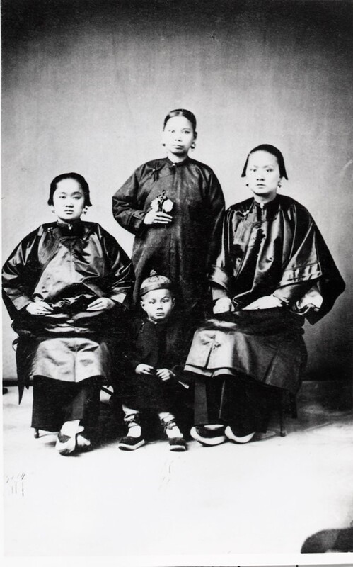 Portrait of three Chinese women and a Chinese boy in Virginia City, Nevada, circa 1880s